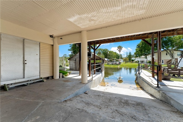 view of patio / terrace with a water view