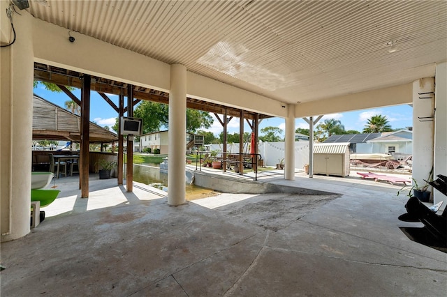 view of patio / terrace featuring a water view