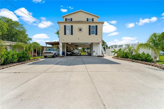 view of property featuring a carport