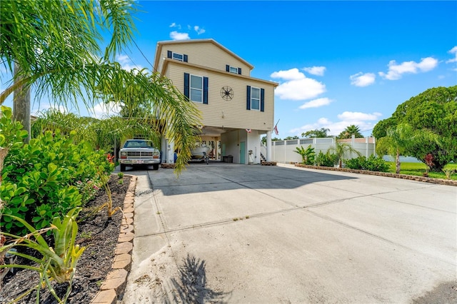 view of front of home with a carport