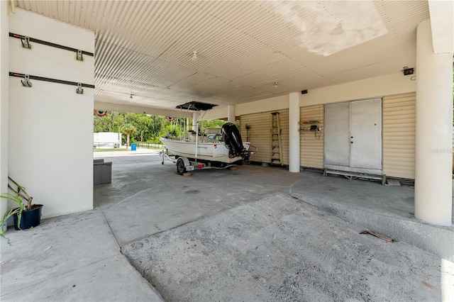 garage featuring a carport