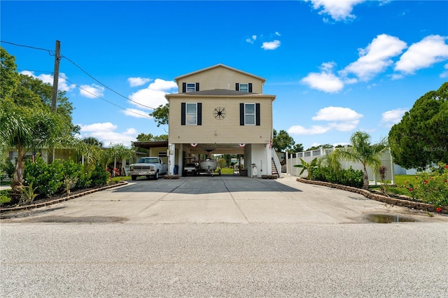 view of front of home with a carport