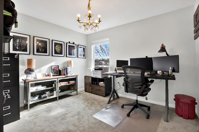 carpeted home office with a notable chandelier