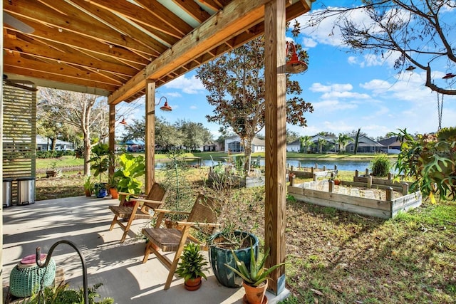 view of patio / terrace with a water view