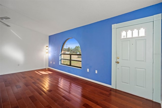 entrance foyer with dark hardwood / wood-style floors