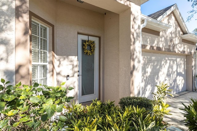 property entrance with a garage