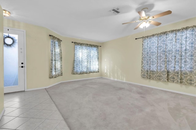 carpeted empty room with ceiling fan