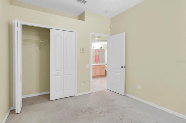 unfurnished bedroom featuring light colored carpet