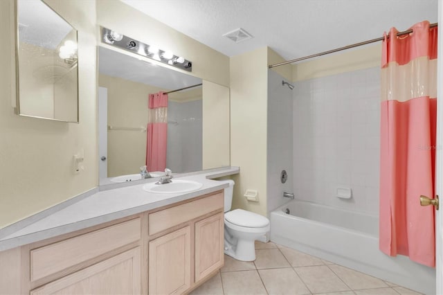 full bathroom with a textured ceiling, shower / bathtub combination with curtain, tile patterned floors, vanity, and toilet