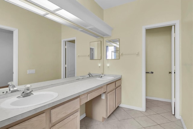 bathroom featuring tile patterned floors and vanity