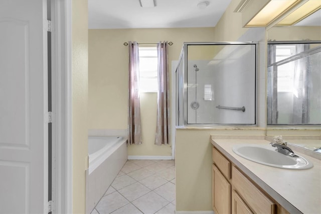 bathroom with vanity, separate shower and tub, and tile patterned flooring