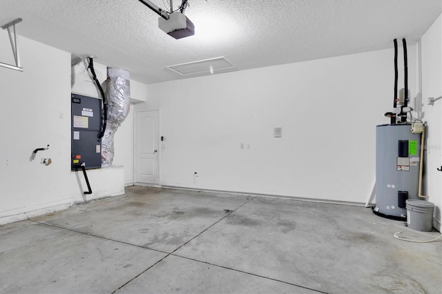 garage with water heater and a garage door opener