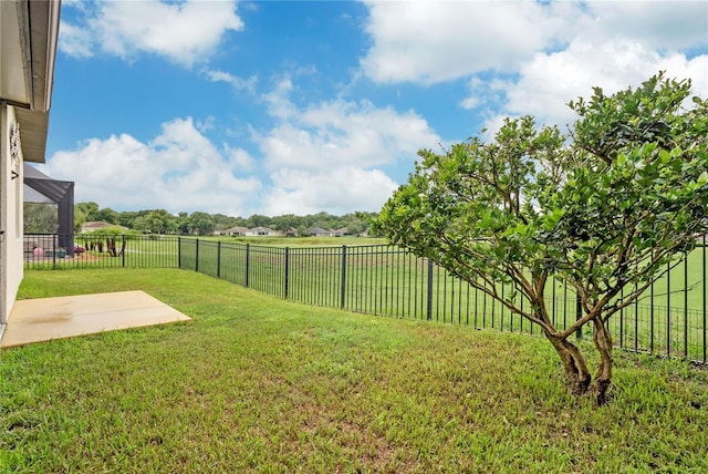 view of yard featuring a rural view and a patio area