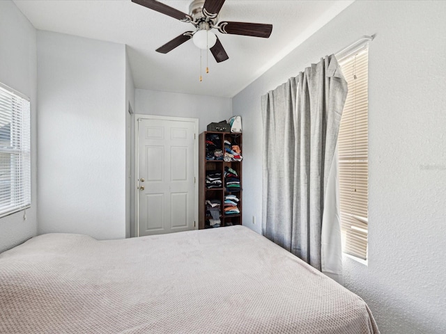 bedroom featuring ceiling fan