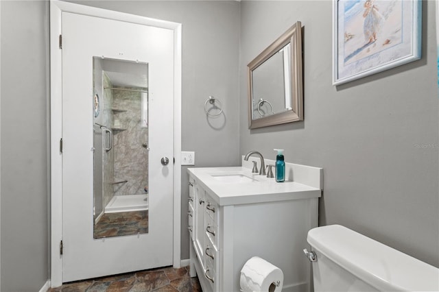 full bathroom with bathtub / shower combination, vanity, and toilet