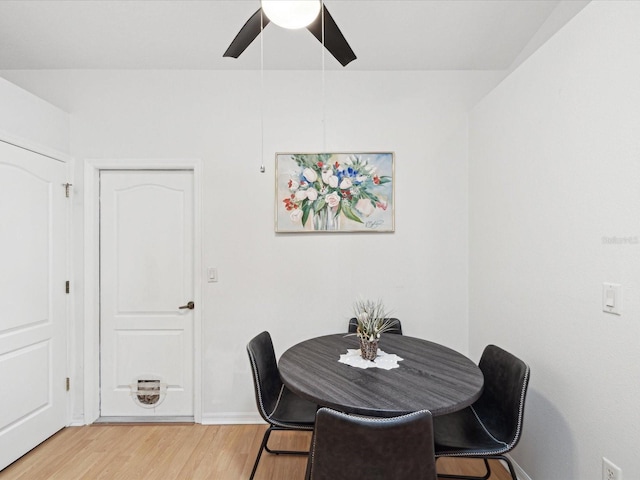 dining area featuring ceiling fan, wood finished floors, and baseboards