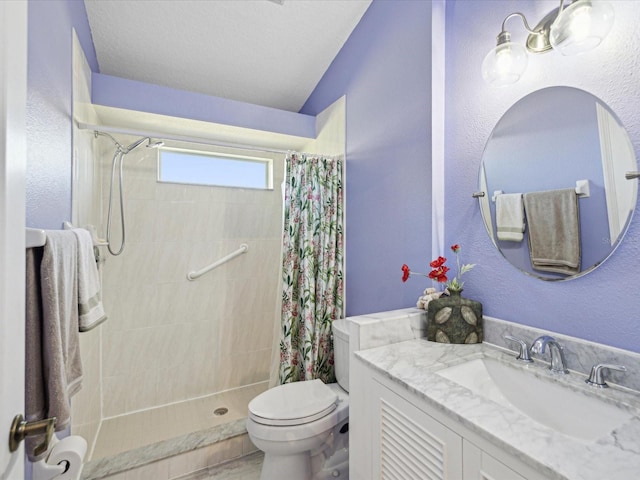 full bath with toilet, a shower stall, vanity, and lofted ceiling