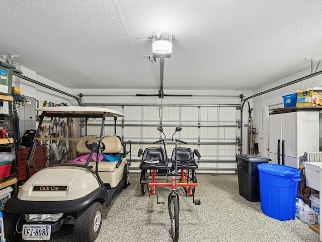 garage featuring a garage door opener