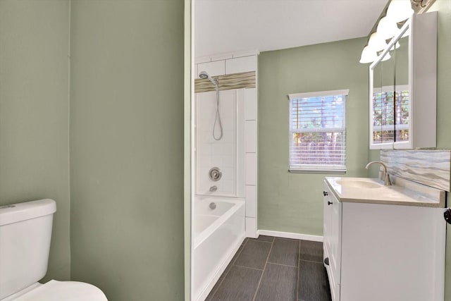 full bathroom with tile patterned floors, vanity, toilet, and tub / shower combination