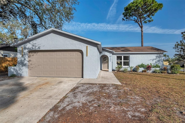 single story home featuring a garage