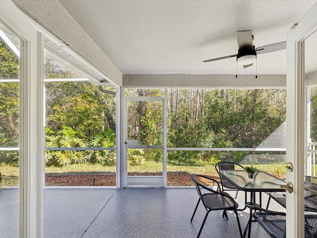 sunroom / solarium with ceiling fan