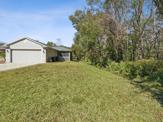 view of yard with a garage