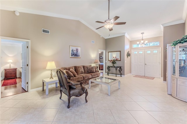 living room featuring light tile patterned floors, high vaulted ceiling, ceiling fan with notable chandelier, and ornamental molding