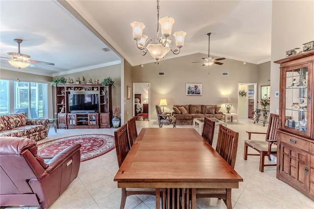 tiled dining room with ceiling fan with notable chandelier, vaulted ceiling, and ornamental molding