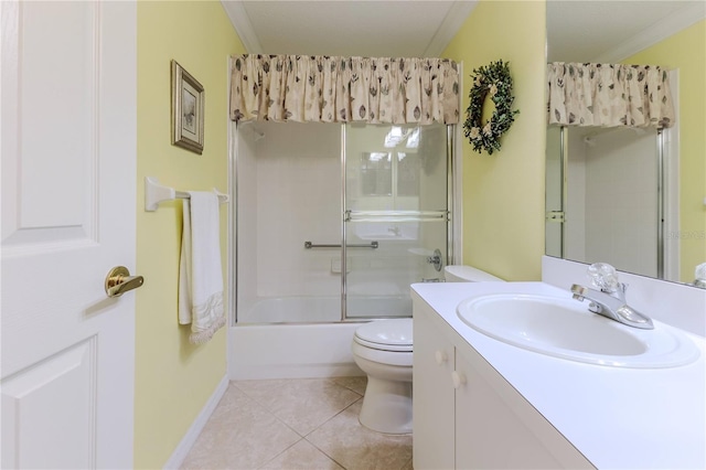 full bathroom featuring tile patterned flooring, toilet, bath / shower combo with glass door, and crown molding