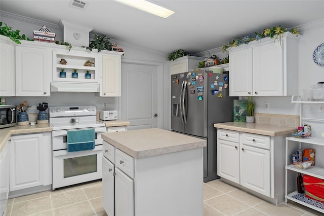 kitchen with white cabinetry, a center island, ventilation hood, lofted ceiling, and appliances with stainless steel finishes