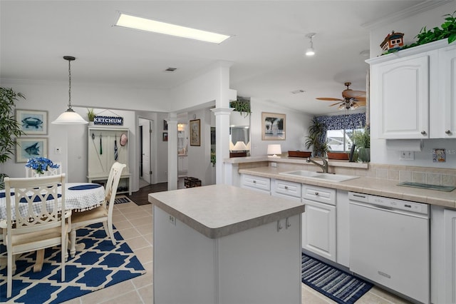 kitchen featuring dishwasher, white cabinetry, ceiling fan, and sink