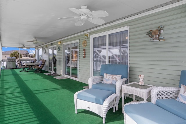 view of patio / terrace featuring ceiling fan