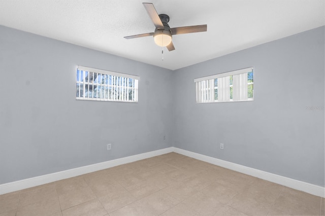 empty room featuring ceiling fan