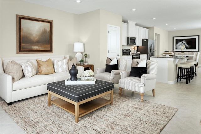 living room featuring light tile patterned floors