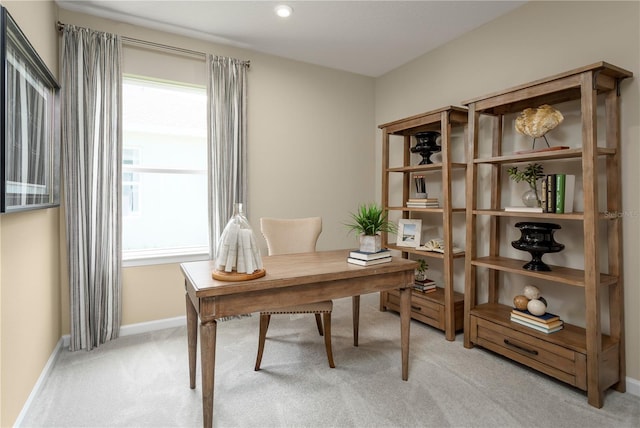 carpeted office space featuring plenty of natural light