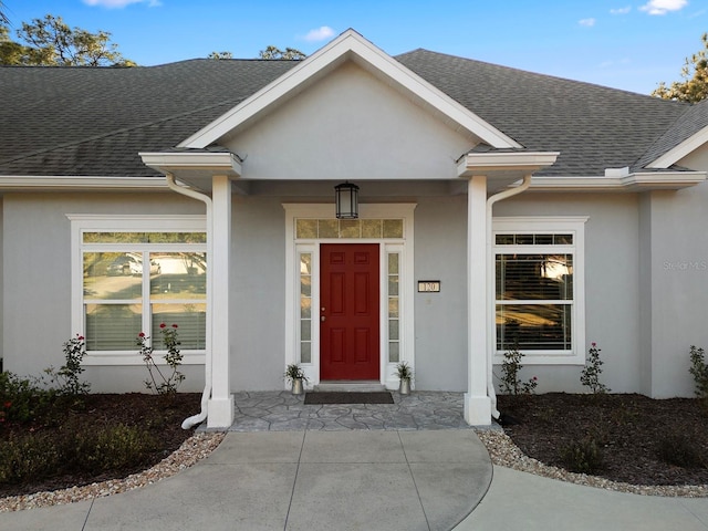 entrance to property with covered porch