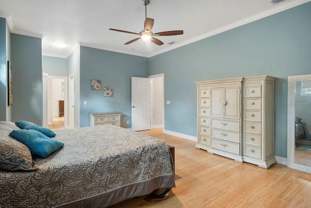 bedroom with ceiling fan, ensuite bath, ornamental molding, and light hardwood / wood-style flooring