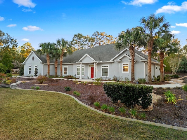 view of front facade featuring a front yard