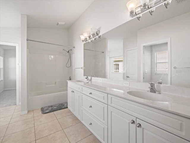 bathroom featuring tile patterned flooring, vanity, and shower / bath combination