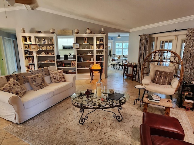 tiled living room featuring vaulted ceiling, ceiling fan, and ornamental molding