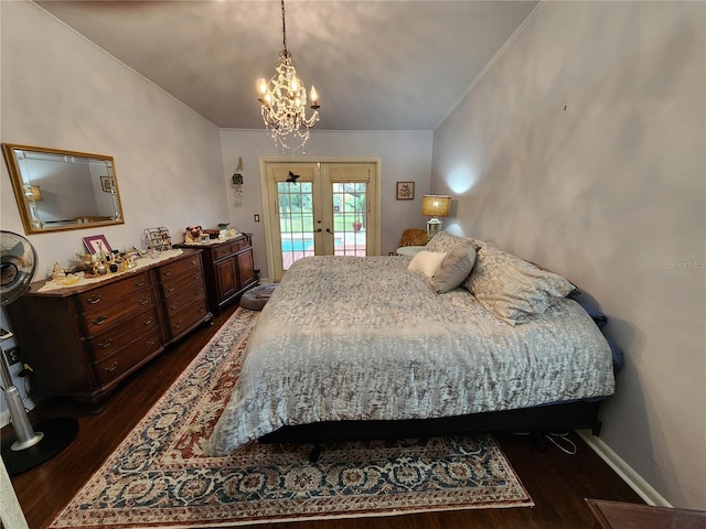 bedroom with a chandelier, french doors, access to outside, and dark wood-type flooring