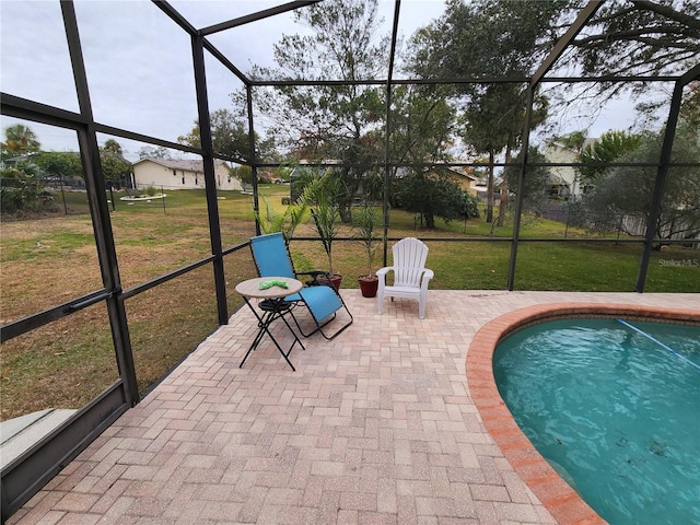 exterior space with a patio area, a lanai, and a yard