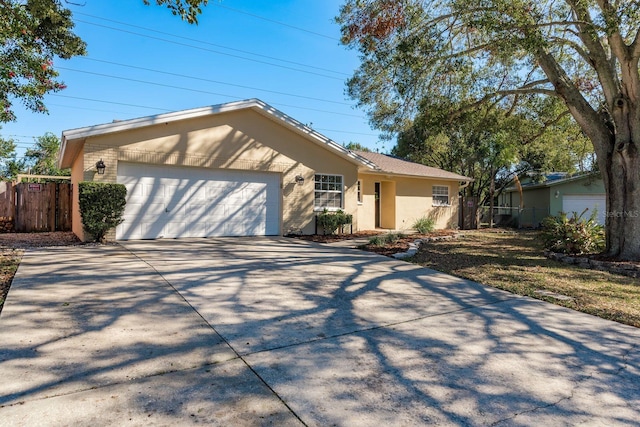 single story home with a garage