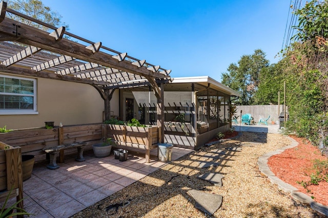 view of patio featuring a pergola