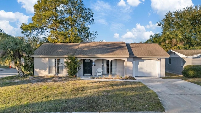 ranch-style home with a front yard and a garage