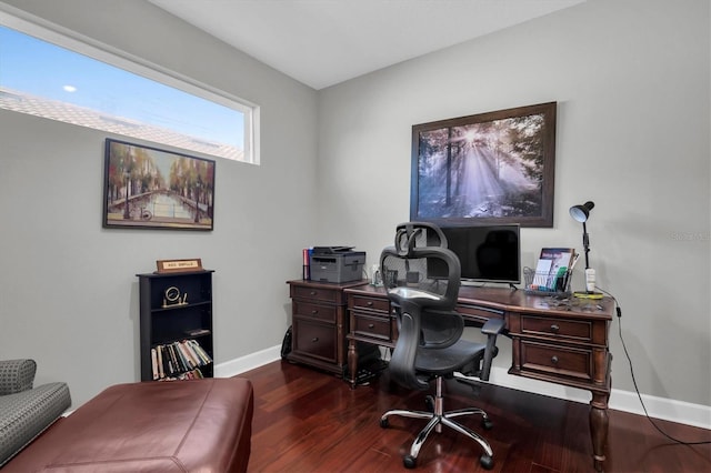 office space featuring baseboards and dark wood-style flooring