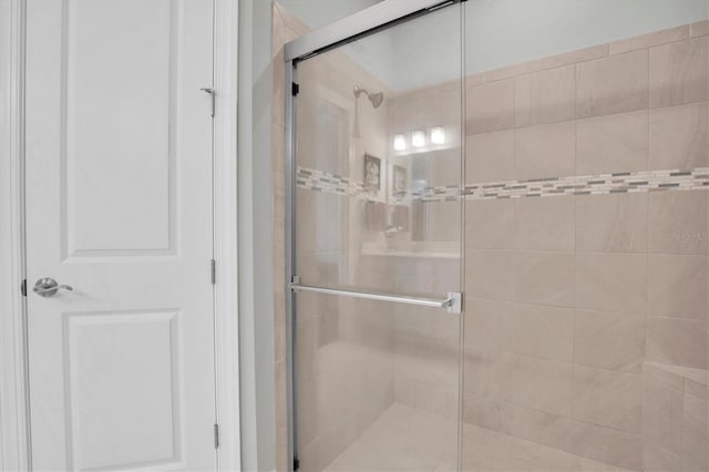 bathroom with a stall shower