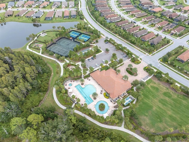aerial view with a residential view and a water view