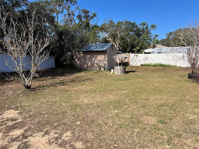 view of yard with a storage shed