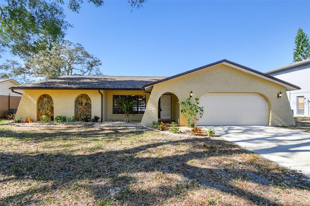 single story home with a garage